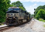 NS 8124 leads an intermodal onto the single track 